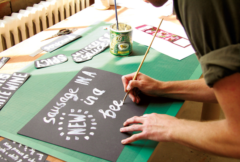 Illustration for article titled 9 Gorgeous Pieces of Hand-Lettered Art You'll Find On Shelves Near You
